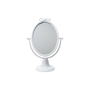 White mirror with bow on stand